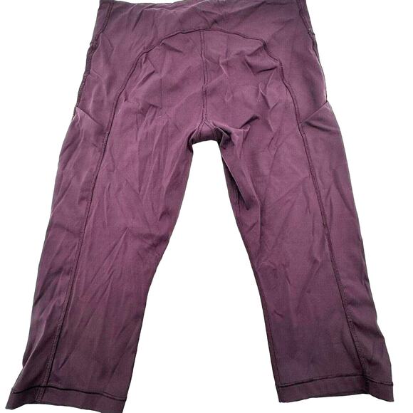 ATHLETA | Large Ultimate Stash Pocket Crop Compression High Rise Purple Leggings - Picture 2 of 9